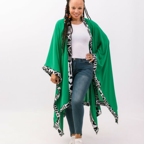 “Don't underestimate the captivating allure of this Bottle Green Tribal kimono. A unique piece that exude timeless style and cultural heritage.”