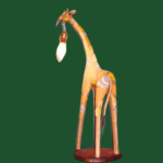 Image of a giraffe lamp sculpted from upcycled materials including various patterned yellow fabric patches